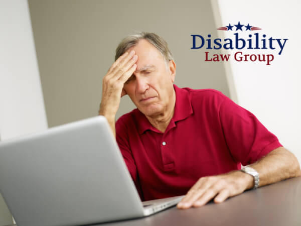 Frustrated Michigan man struggling with SSD application process, seeking help from Disability Law Group for benefits approval.
