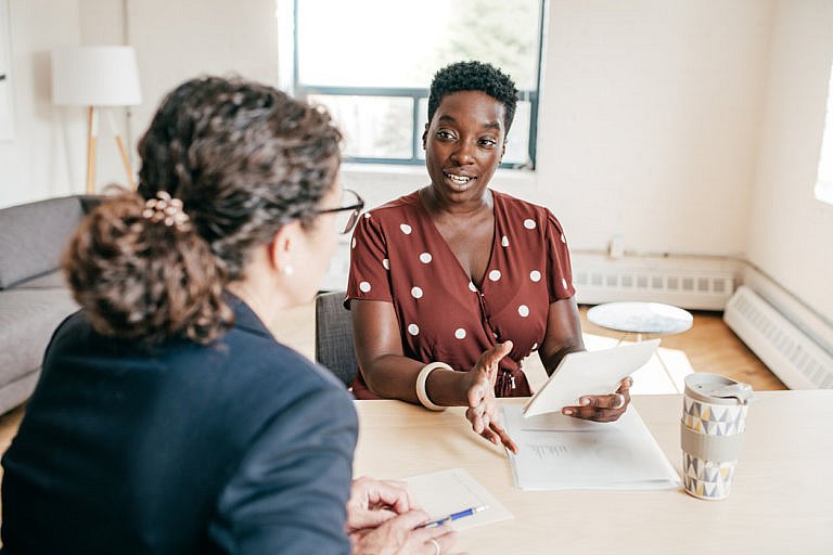 female attorney with female client
