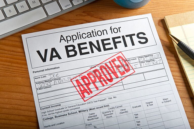 Approved VA benefits application form on desk – VA benefits claims in Oakland County, MI