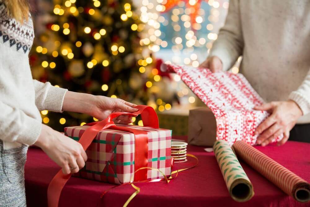 Man and woman preparing for Christmas.