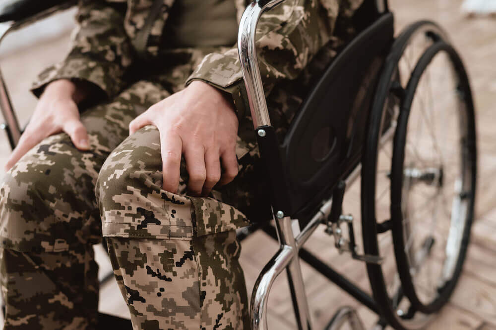 Close-up photo veteran in a wheelchair.