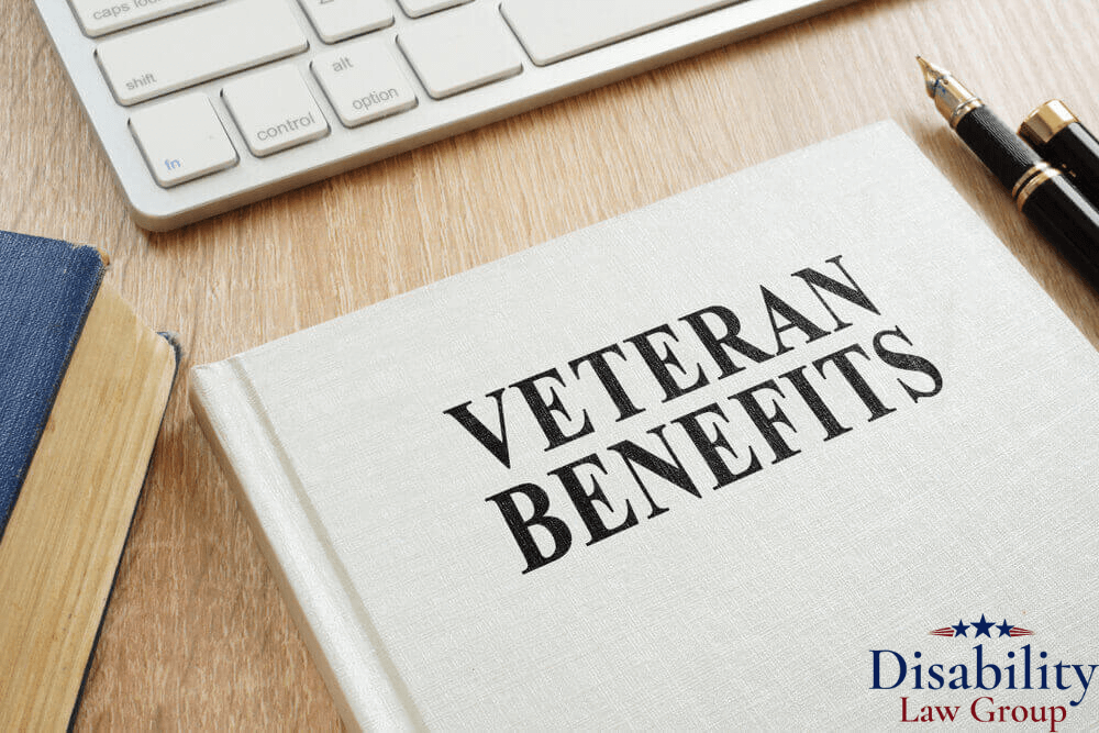 Veterans’ benefits guidebook on desk symbolizing legal help for VA disability, pensions, healthcare, and housing support.