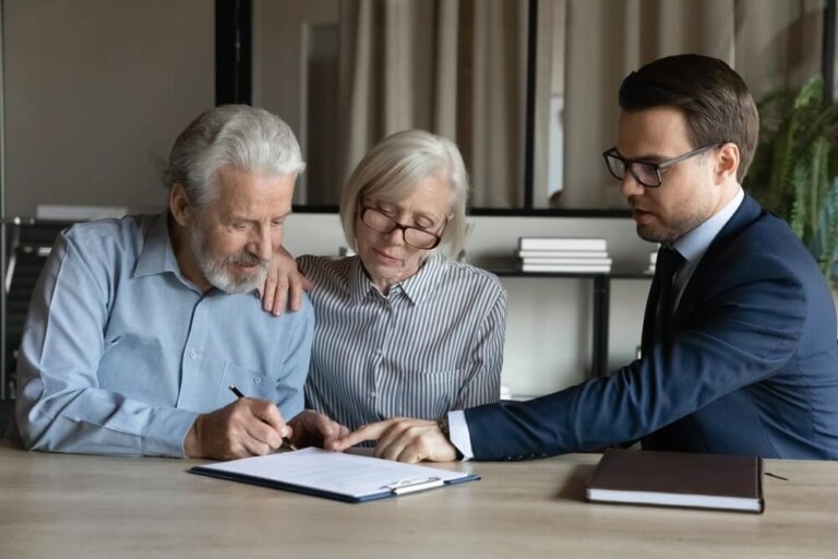 Veterans receiving guidance from a disability attorney while reviewing VA claim paperwork in 2026.